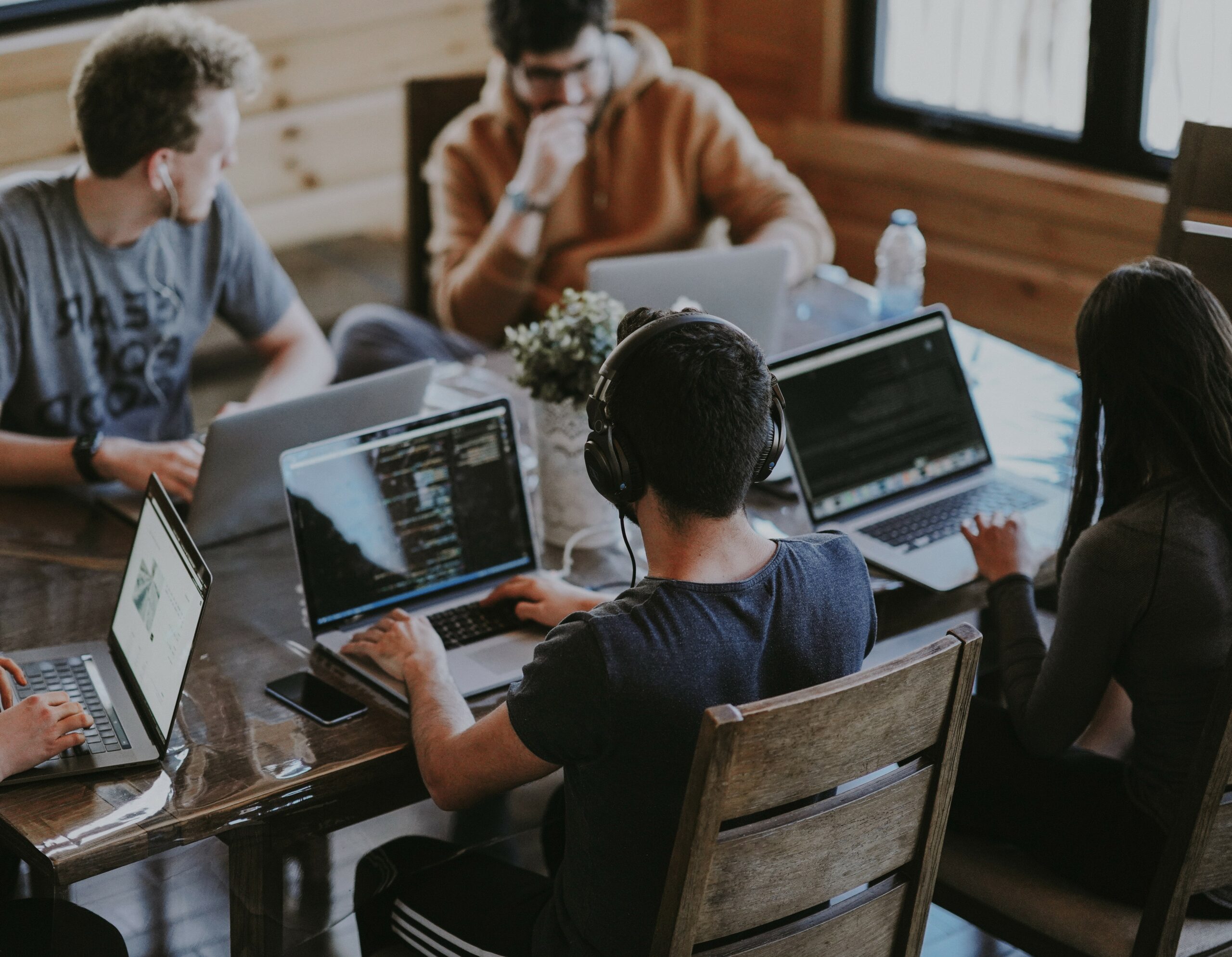 Guys working around a table