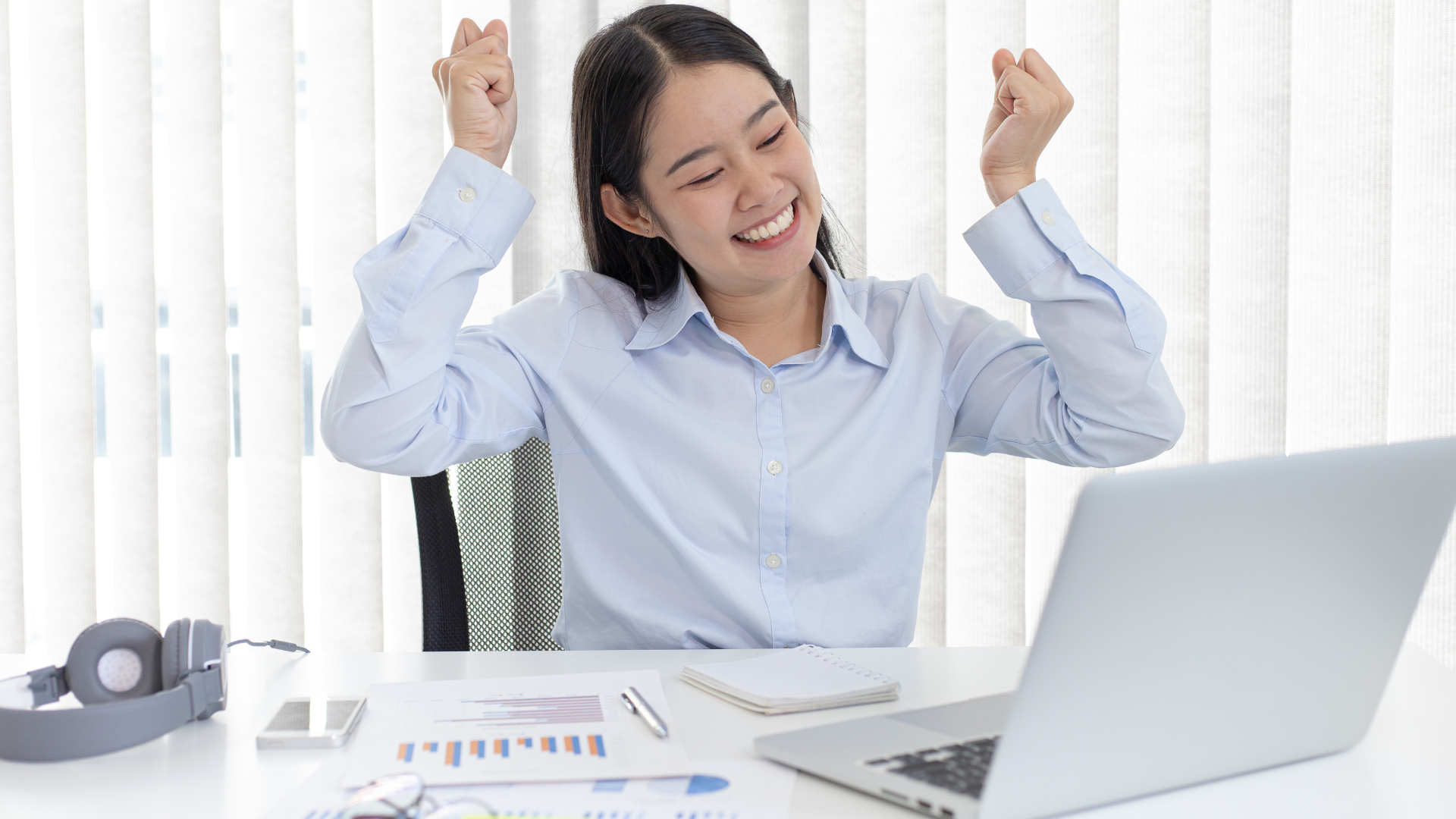 A very happy woman at work.